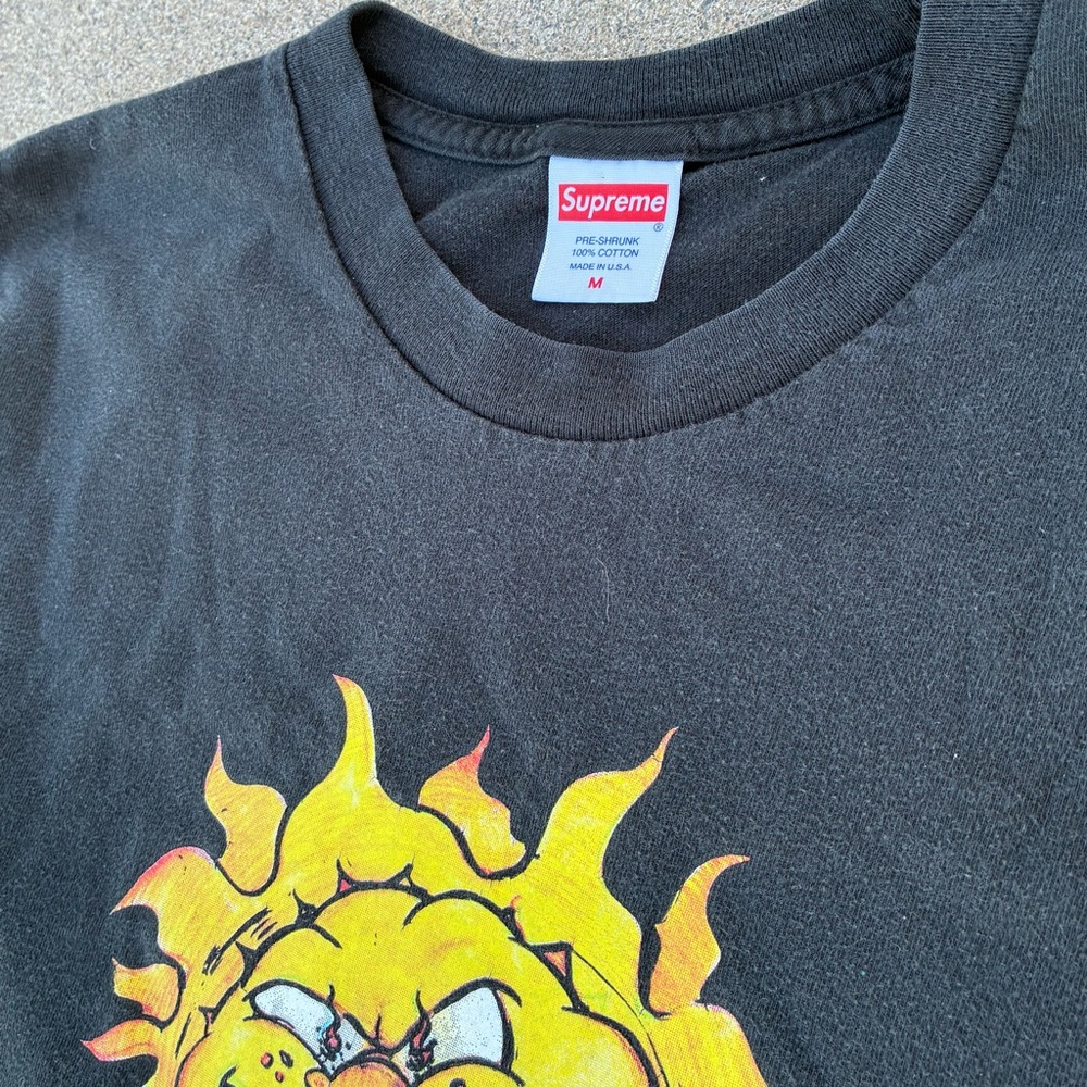 Supreme Black Tee with Fiery Sun Design
